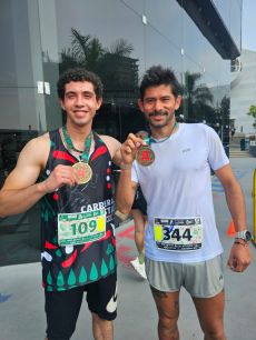 Marcelo Aguire y Christian Omar Villa Martínez ganador de los 10 km.